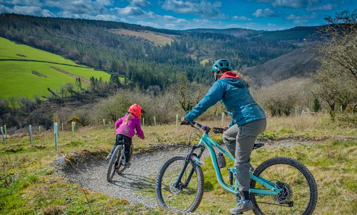A young rider and her mam enjoying the trails together.
